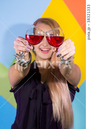 Cheerful woman with a glass 38321333
