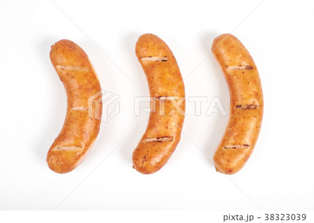 Grilled sausages isolated on a white background 38323039