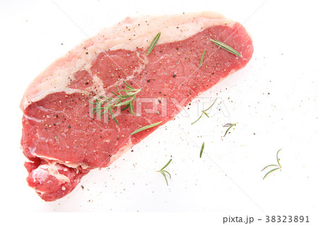 Fresh raw beef steak with pepper and rosemary  38323891