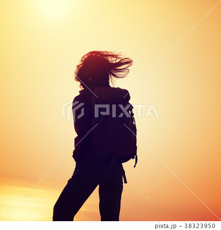 freedom woman standing on sunrise windy coast freedom woman standing on sunrise windy coast 38323950