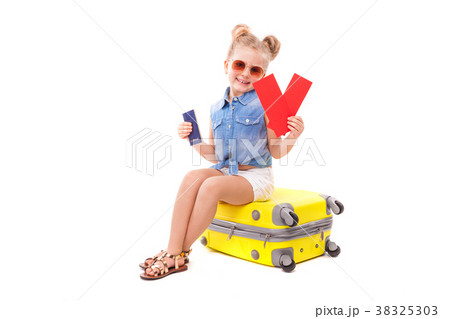 Attractive little girl in blue shirt, white shorts Attractive little girl in blue shirt, white shorts 38325303