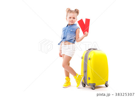 Pretty little girl in blue shirt, white shorts and Pretty little girl in blue shirt, white shorts and 38325307