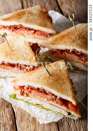 Club sandwich with turkey, bacon, cheese 38325513