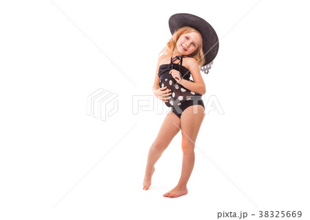 Beauty cute little girl in in black swimwear and 38325669