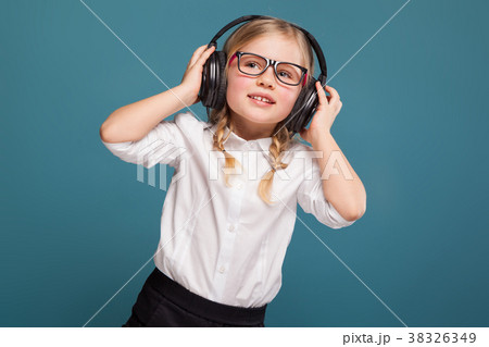Pretty, cute little girl in white shirt, glasses 38326349