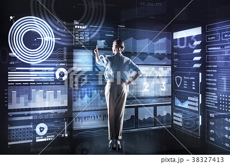 Elegant database administrator looking at the 38327413