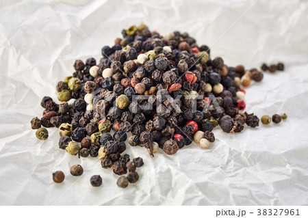 Top view on black, red and white peppercorns Top view on black, red and white peppercorns 38327961