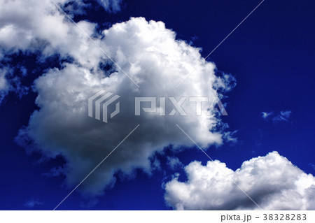white clouds in the bright blue sky white clouds in the bright blue sky 38328283