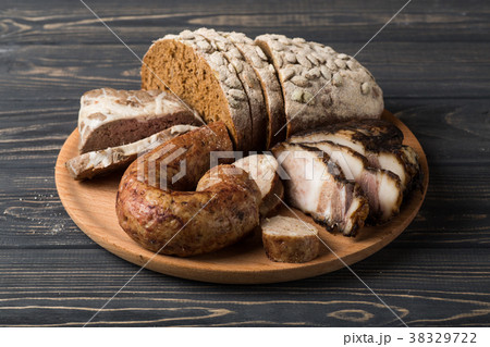 Meat appetizerssausage, ham, bacon with bread Meat appetizerssausage, ham, bacon with bread 38329722