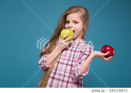 Little beauty girl in shirt with long brown hair Little beauty girl in shirt with long brown hair 38329872