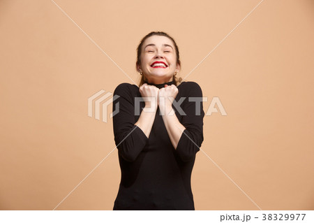 Winning success woman happy ecstatic celebrating 38329977
