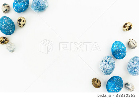 Frame made of blue speckled easter eggs 38330565