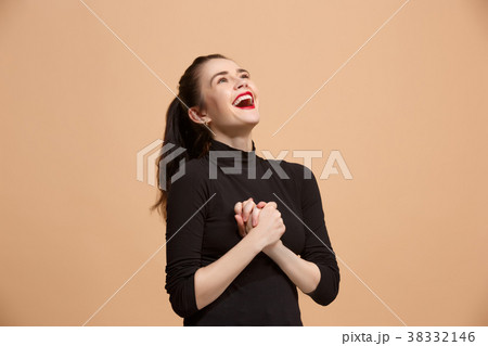 Winning success woman happy ecstatic celebrating Winning success woman happy ecstatic celebrating 38332146