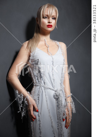 Beautiful girl in designer fashionable transparent Beautiful girl in designer fashionable transparent 38333521