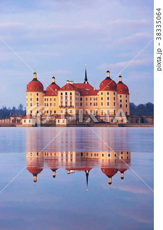 Moritzburg castle after sunrise at winter time 38335064