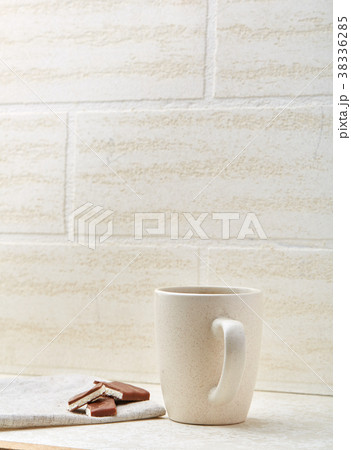 Cup of coffee and chocolate isolated on the white 38336285