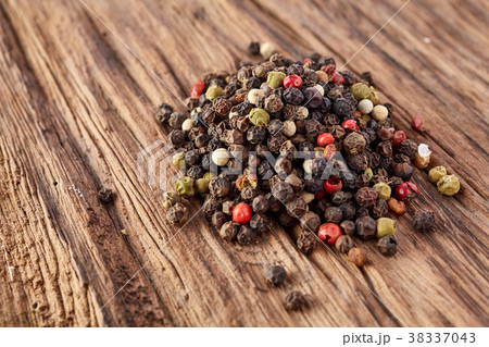 Top view on black, red and white peppercorns 38337043