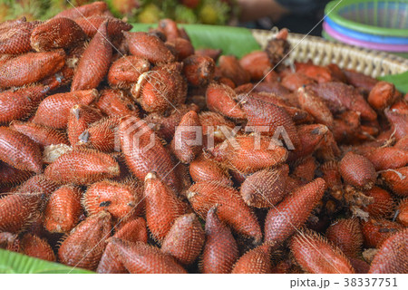 Salacca or Snake Fruit In the basket. Oval shape. 38337751
