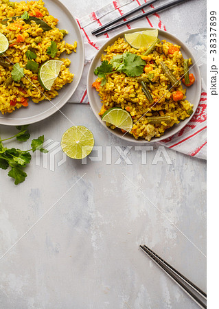 Vegetarian curry rice with vegetables Vegetarian curry rice with vegetables 38337899