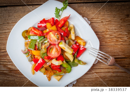 Ratatouille on a rustic table. Ratatouille on a rustic table. 38339537