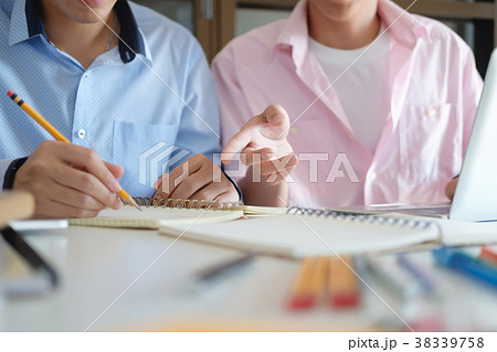 Education concept. Tutor books with friends. 38339758