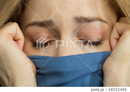 Displeased blonde woman feeling ill Displeased blonde woman feeling ill 38352493