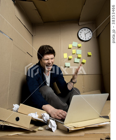 Annoyed manager is yelling on laptop 38353466