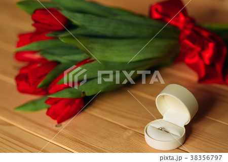 Bouquet of red tulips and diamond ring for Bouquet of red tulips and diamond ring for 38356797