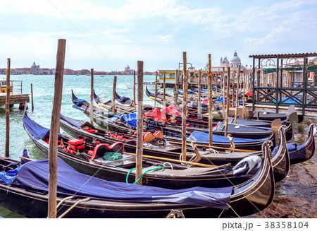 Daylight view to parked boats and historic 38358104