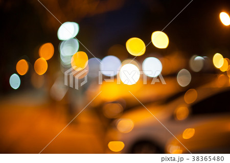 Colorful bokeh on the street at night. Colorful bokeh on the street at night. 38365480