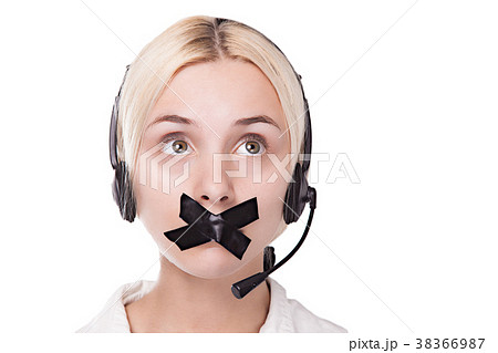 sexy young blond woman in a headset looks up and 38366987