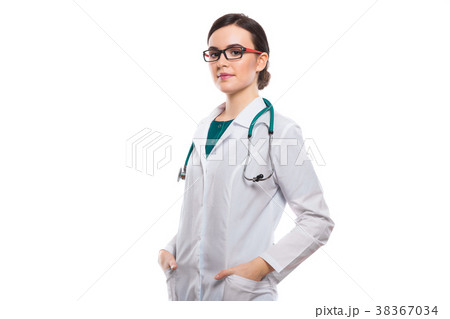 Young woman doctor with stethoscope holding her Young woman doctor with stethoscope holding her 38367034
