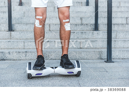 Man feet going on hoverboard 38369088