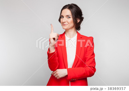 Picture of pretty woman in red blazer showing 38369357