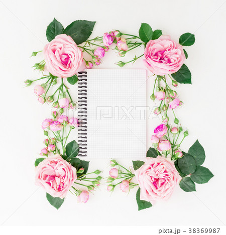 Floral frame with pink roses, buds and notebook Floral frame with pink roses, buds and notebook 38369987
