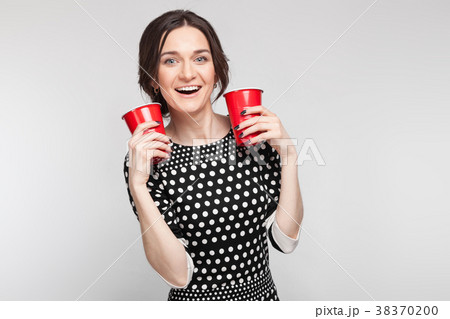 Picture of attractive woman in speckled clothes 38370200