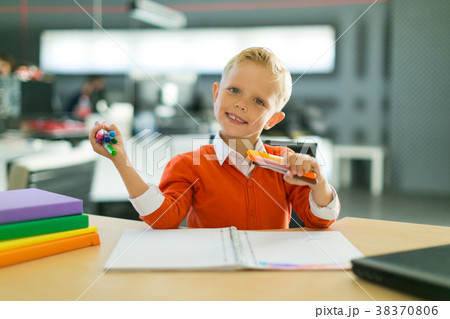 Boy draw in the office 38370806