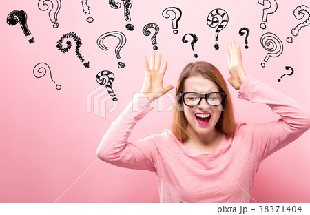 Question Marks with woman feeling stressed 38371404