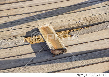 oak wooden beam on a walkway 38371845