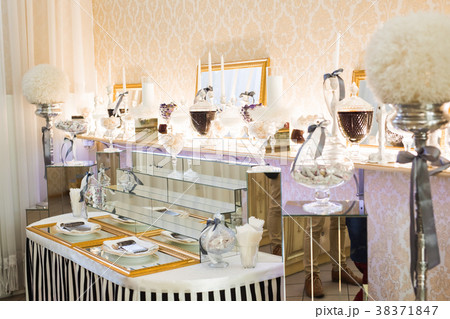 Different kinds of baked sweets on a buffet 38371847