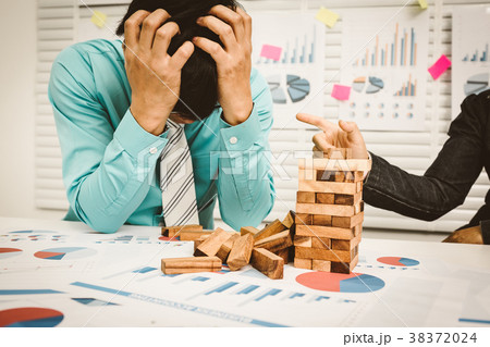 Business man headache and stress, unemployed Business man headache and stress, unemployed 38372024
