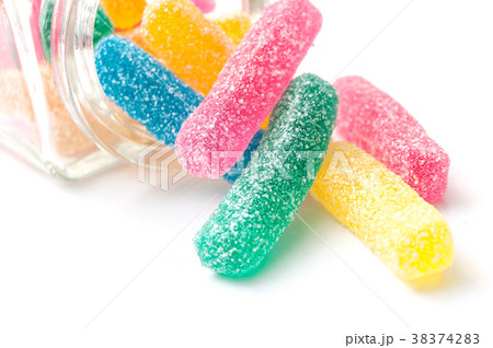 traditional acidulated candies faling glass jar 38374283