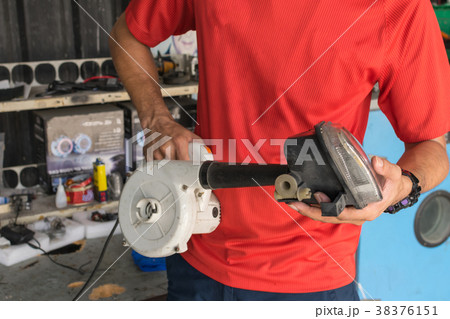 Checking car headlight Checking car headlight 38376151