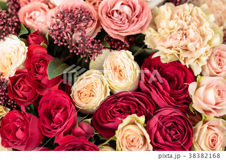 Beautiful luxury bouquet of mixed flowers in red 38382168