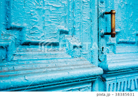 Close-up keyholes with curtains and a handle on Close-up keyholes with curtains and a handle on 38385631