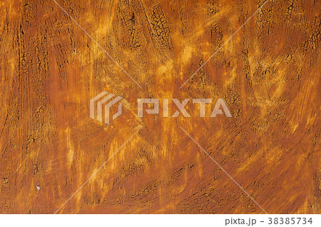 Textured background of a faded yellow paint with 38385734