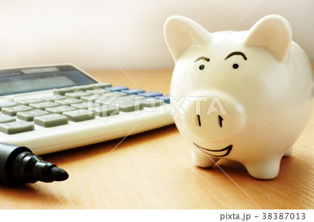 Happy piggy bank. Success savings concept. Happy piggy bank. Success savings concept. 38387013