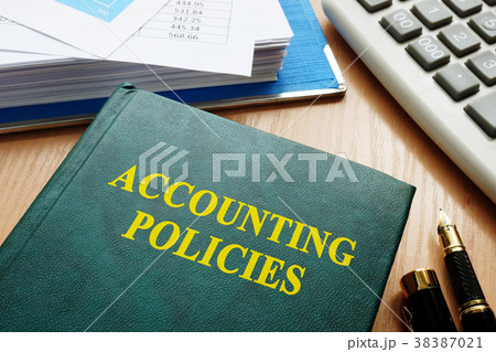 Book with title accounting policies on a table. Book with title accounting policies on a table. 38387021
