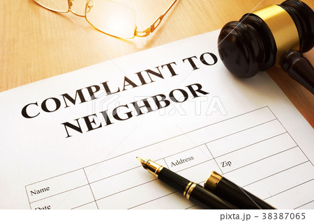 Complaint to neighbor on a table. 38387065