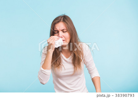 Young woman with handkerchief. Sick girl isolated 38390793